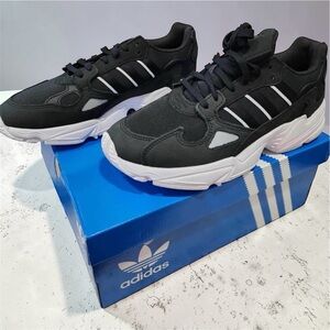 Adidas Woman’s Black and White Sneakers